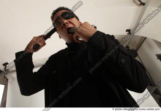 Garson STANDING POSE WITH GUNS SUICIDE